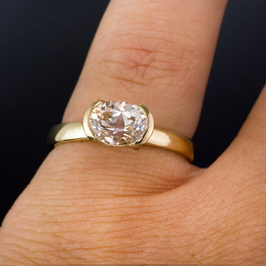 Genuine Oval White Sapphire Half Bezel Solitaire Hannah Engagement Ring Ring by Nodeform