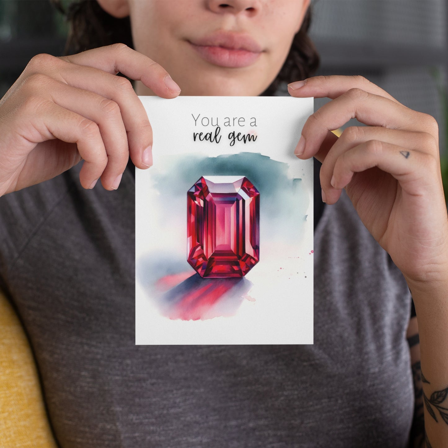 woman holding a You are a real Gem Watercolor Emerald Shape Ruby Birthstone Greeting Thank you Card