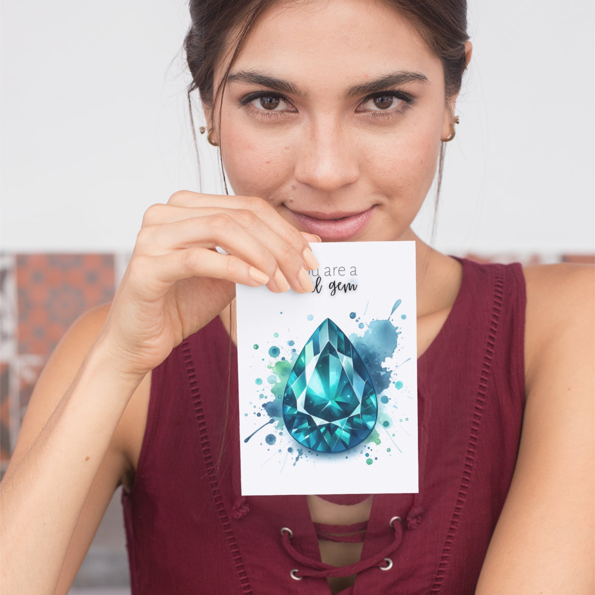 woman holding a Watercolor Pear Teal Sapphire You are a Real Gem Greeting Card