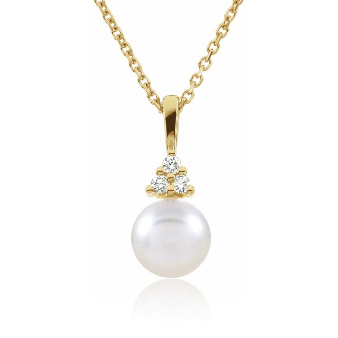 White Akoya Pearl Diamond Accented 14k Yellow Gold Dangle Pendant Necklace against white reflectie background
