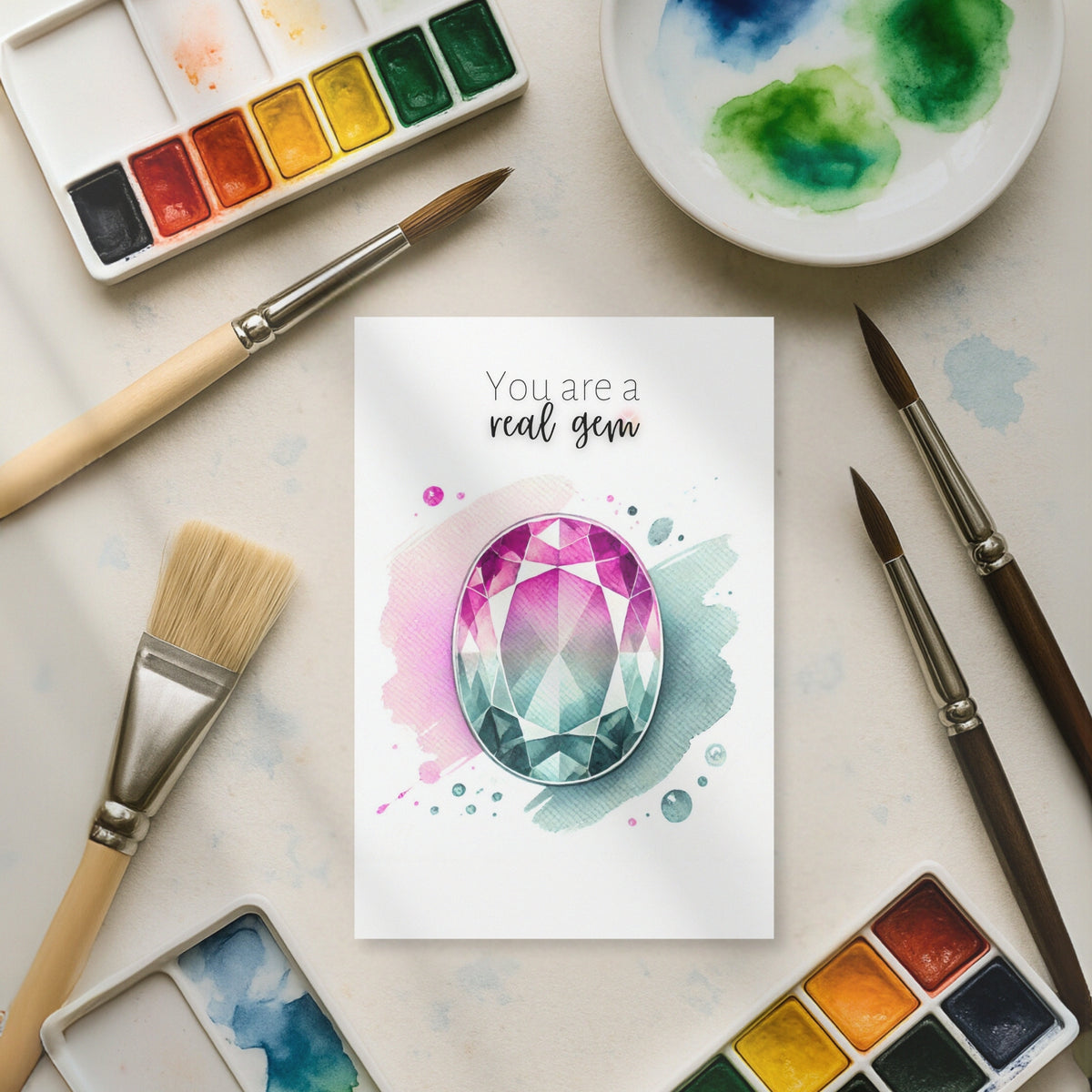 watercolor artist table with "You are a real Gem" Watercolor Oval Bi-color Tourmaline Folded Card Cards by Nodeform