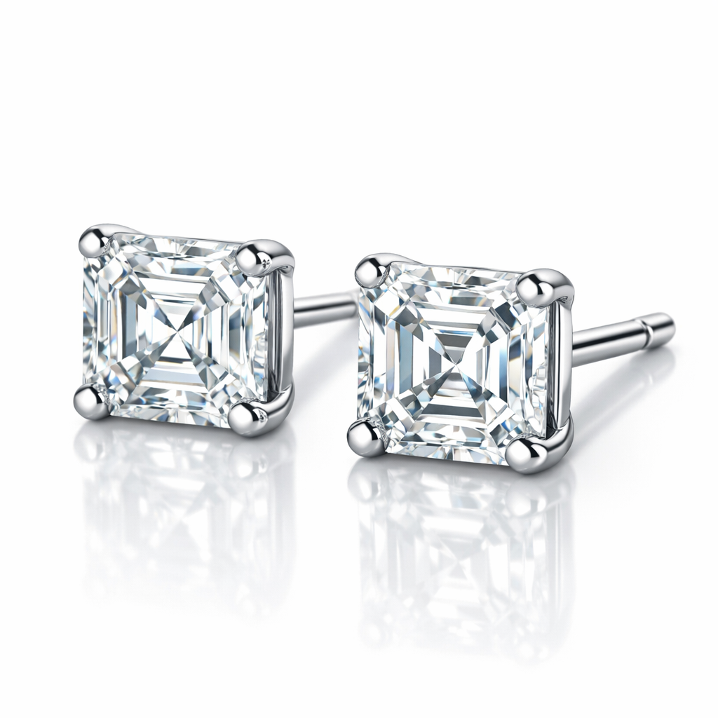 Pair of asscher cut moissanites or diamond stud earrings on a reflective surface with a reflective background