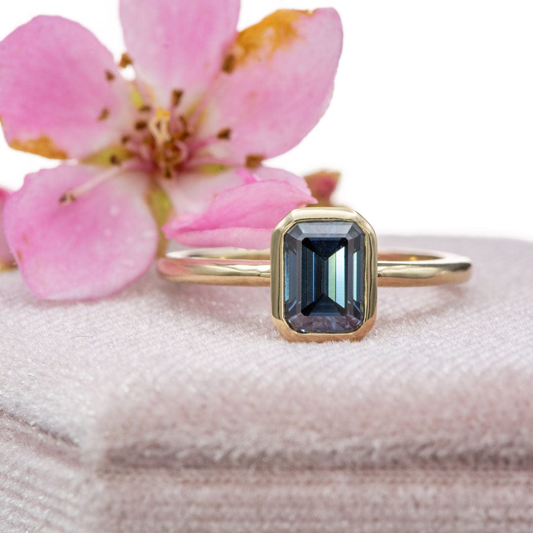 Emma Bezel Set Blue-Gray Emerald Cut Moissanite Solitaire Engagement Ring Ring Setting by Nodeform
