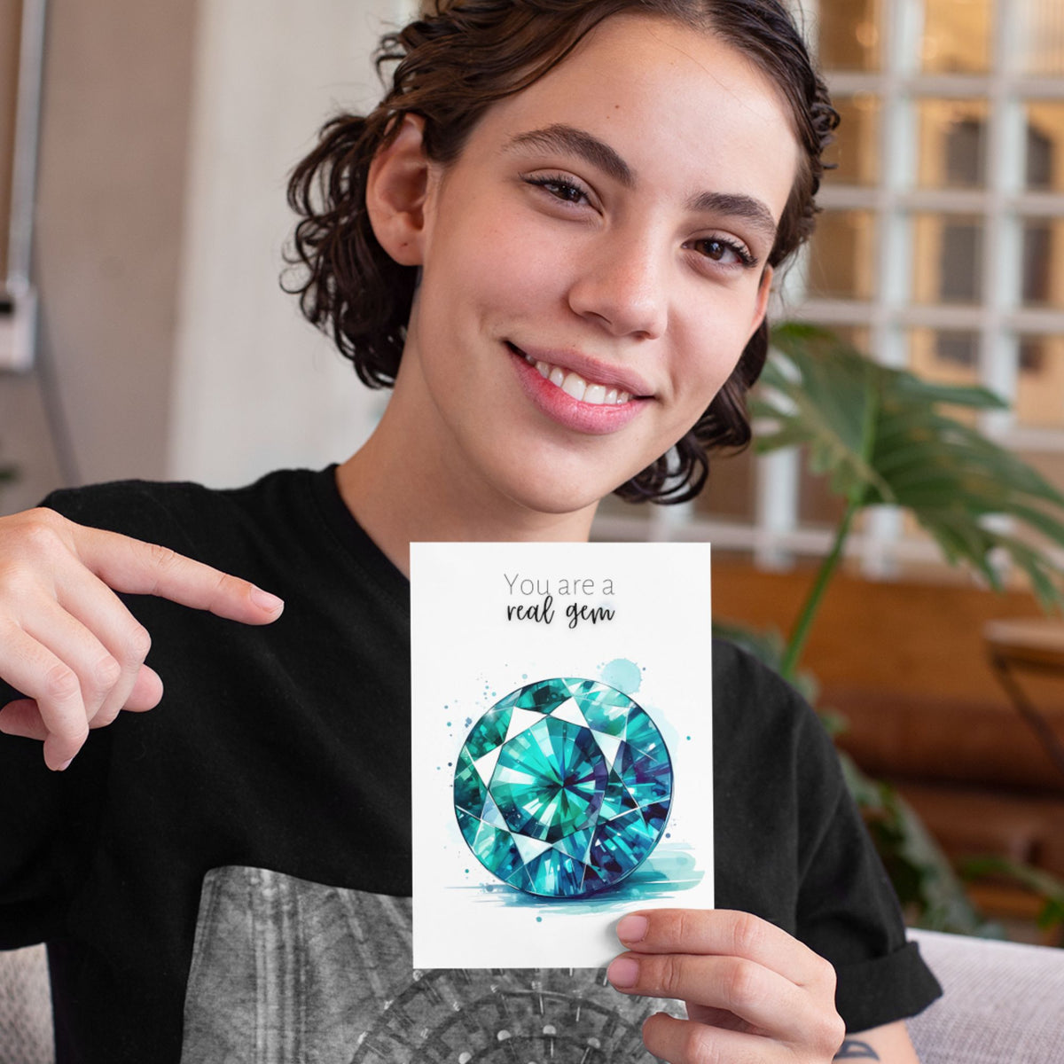 Woman holding a You are a real gem | Watercolor Round Teal Sapphire Greeting Card
