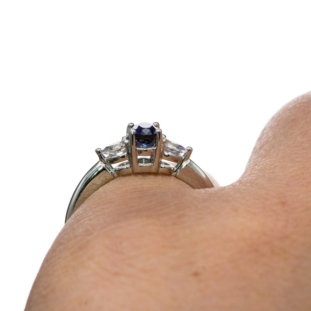 Tressa - Three Stone Prong Set Oval Lab Sapphire Engagement Ring with Pear-shaped White Sapphire Accents Ring by Nodeform
