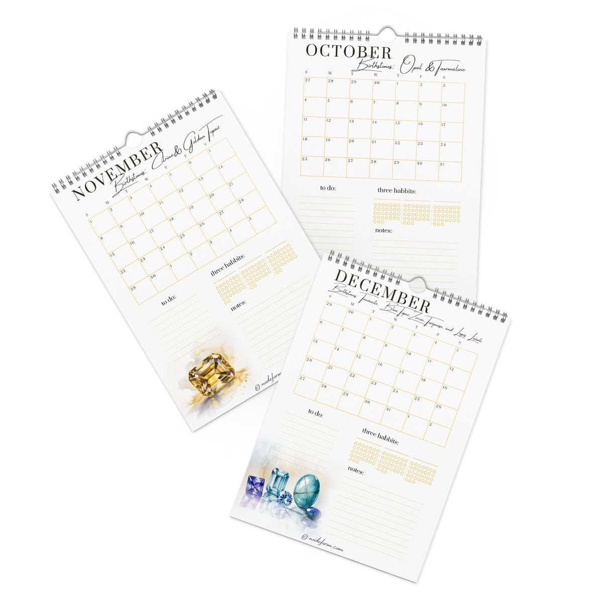 Three spiral-bound calendars for November, October, and December on a white background.