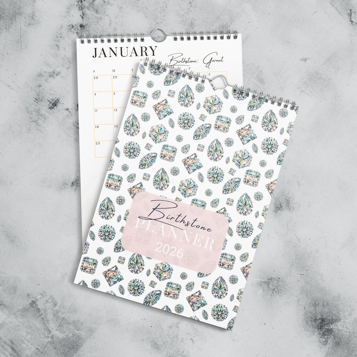 Calendar with gemstone pattern on a marble surface