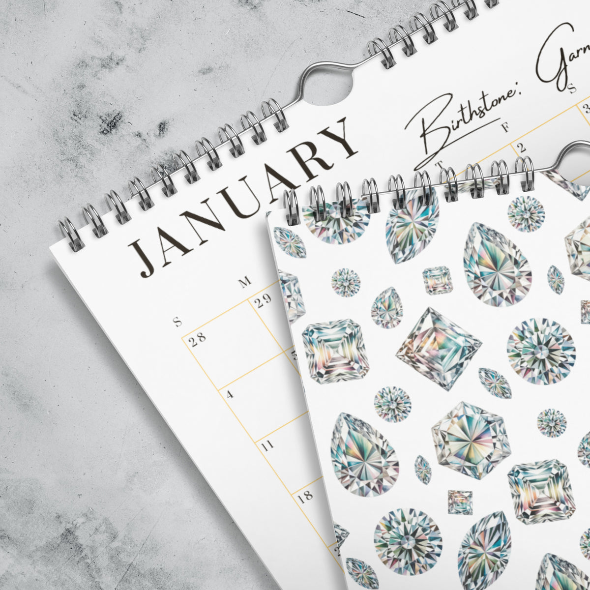 Calendar with January page and diamond pattern on a gray surface