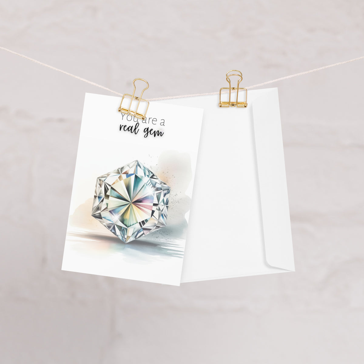 Greeting card with a hexagon diamond illustration and text 'You are a real gem' on a white background.