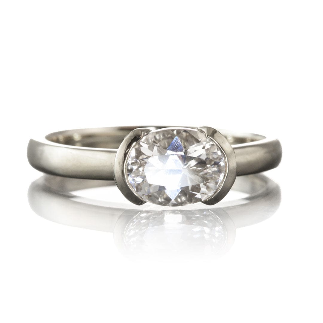 Genuine Oval White Sapphire Half Bezel Solitaire Hannah Engagement Ring Ring by Nodeform
