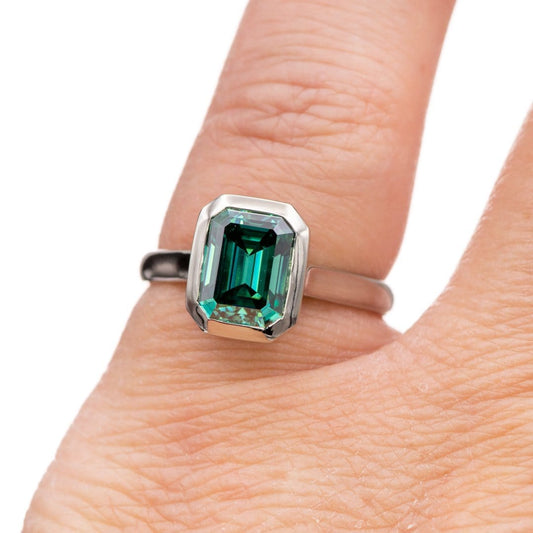 Emerald Cut Green Moissanite Olivia Bezel Set 14k White Gold Solitaire Cathedral Engagement Ring Ring Ready To Ship by Nodeform