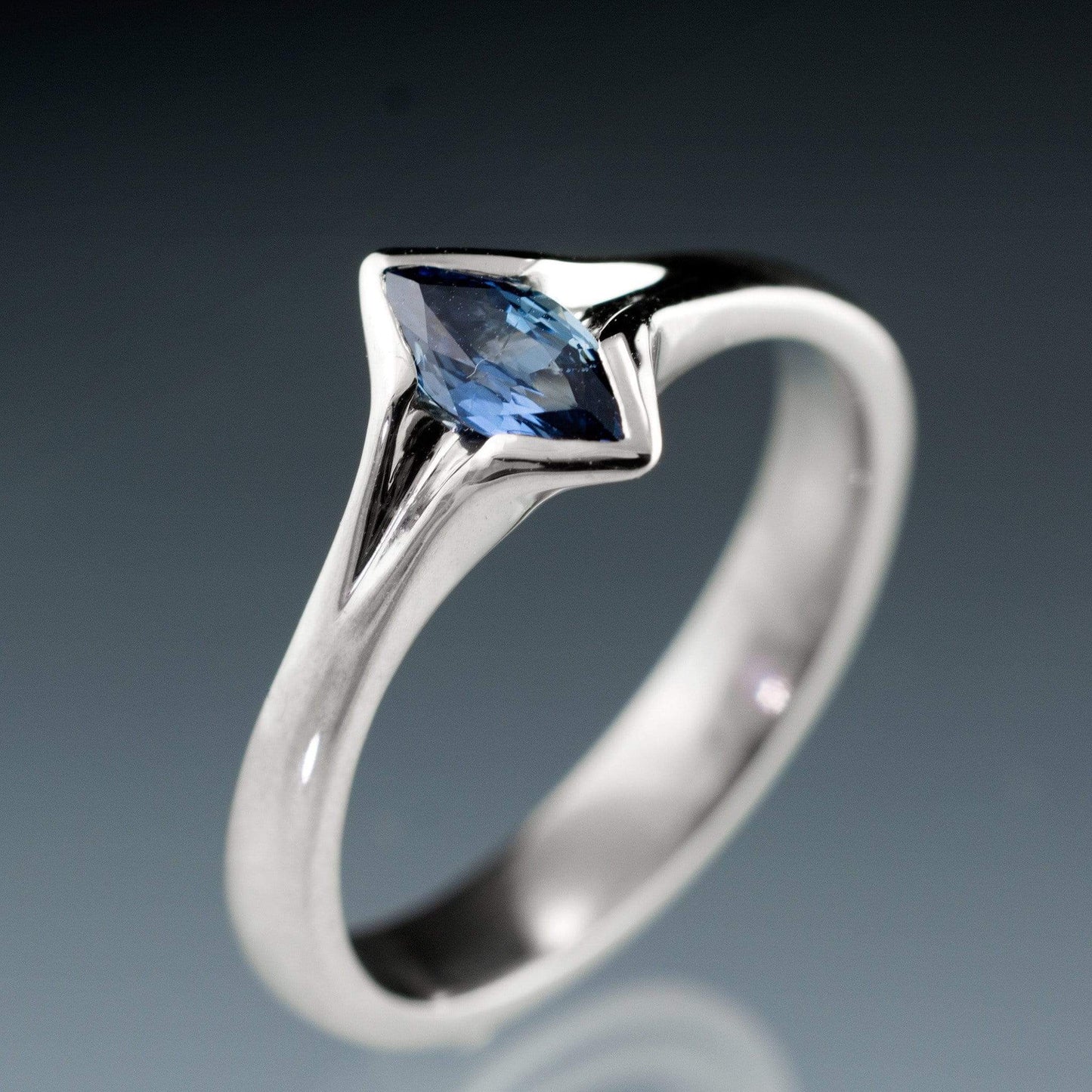 Marquise Blue Sapphire Semi-Bezel Solitaire Engagement Ring Ring by Nodeform
