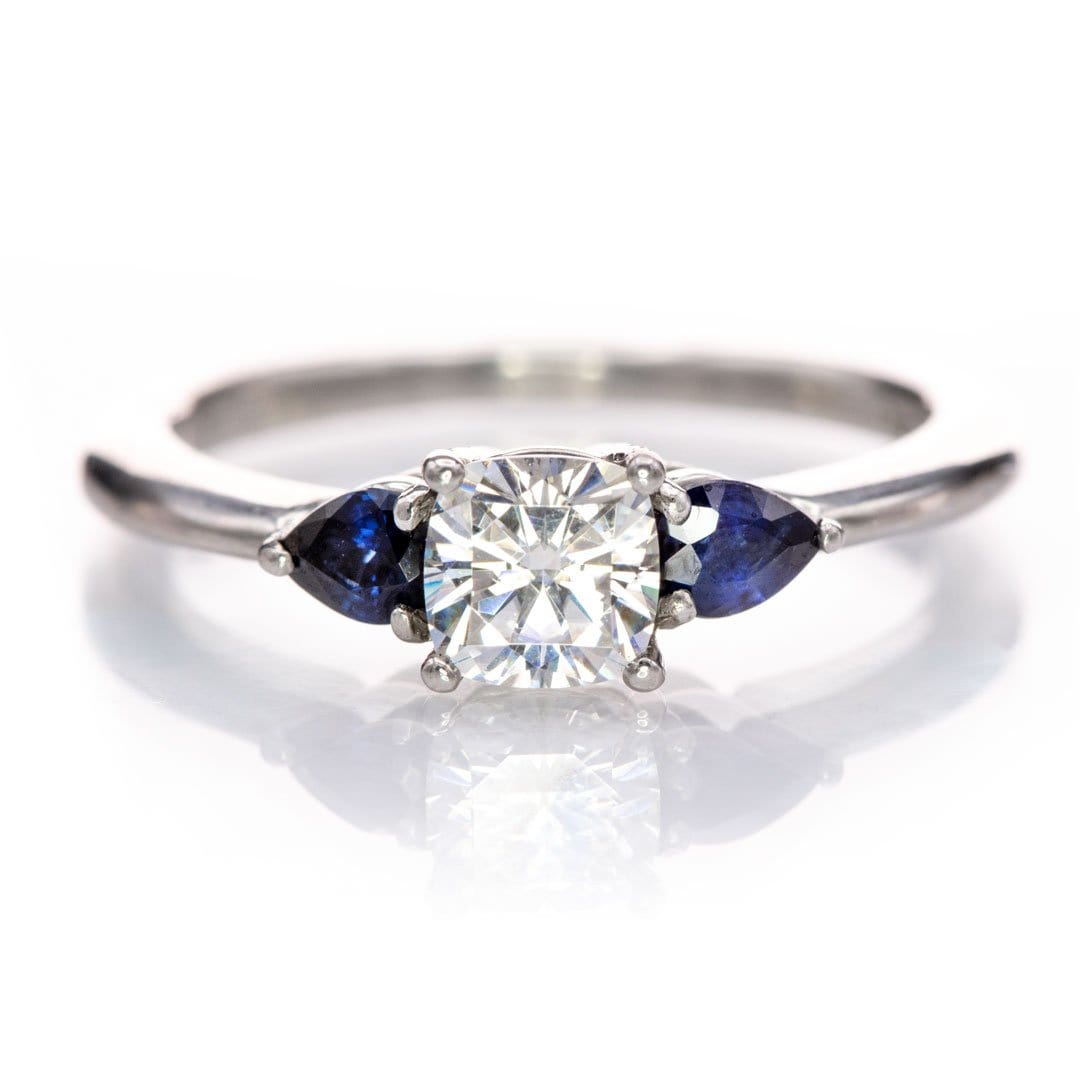 Tressa- Three Stone Engagement Ring, Prong set Cushion Moissanite & Pear Blue Sapphire Accents 5mm Colorless F1 Moissanite (DEF Color) / 14k Nickel White Gold Ring by Nodeform