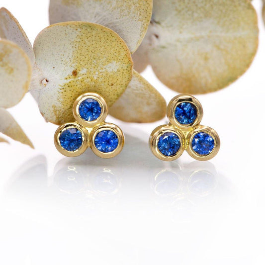 Australian Kings Plain Royal Blue Sapphire Trio Bezel Cluster Stud 18kY Gold Earrings, Ready To Ship Earrings by Nodeform