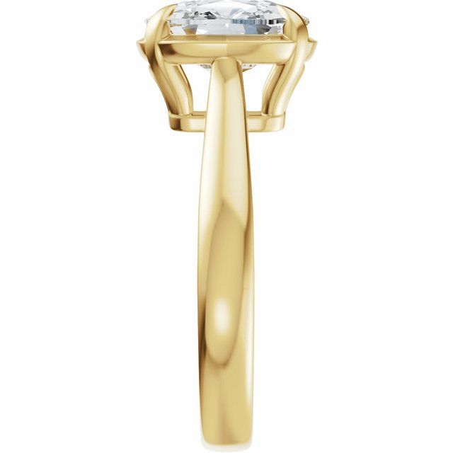 side view Taylor engagement ring  in yellow gold with a large elongated antique cut cushion moissanite on a white reflective background