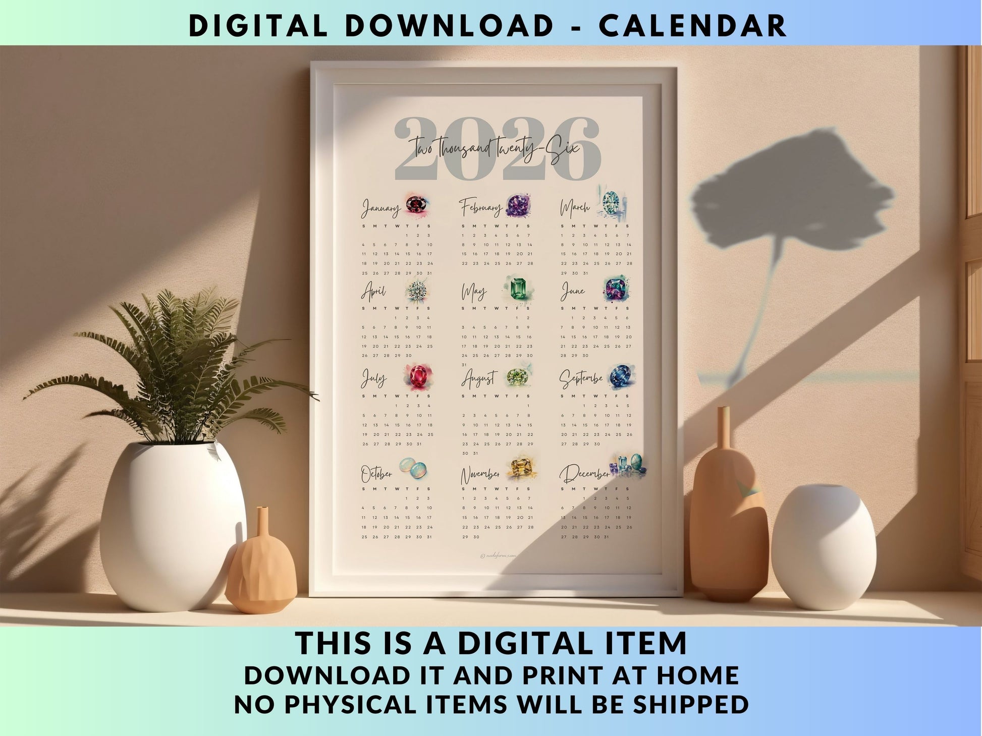 Digital 2026 birthstone calendar displayed in a frame on a shelf with decorative items.
