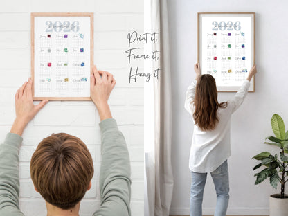 Two people holding framed 2026 birthstone calendars against a white wall.