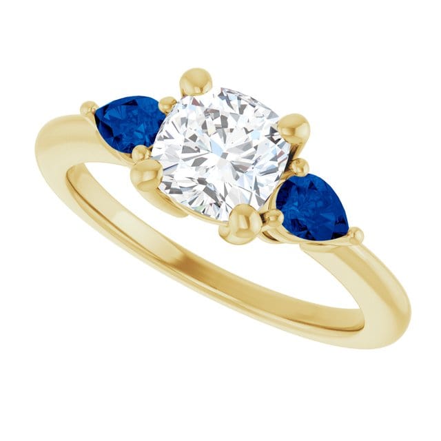 Tressa Bridal Set- Three Stone Cushion Moissanite Engagement & Pear Blue Sapphire Accents With Cecilia Band