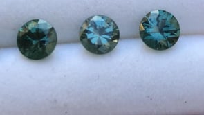 Fair Trade Teal/Blue Montana Sapphire Half Bezel White Sapphire Star Dust Engagement Ring
