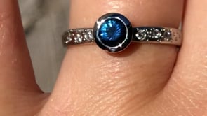 Fair Trade Blue Australian Kings Plain Sapphire Elevated Bezel Diamond Star Dust Engagement Ring