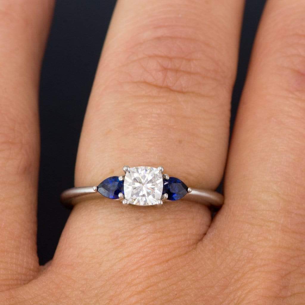 Three stone engagement ring store with sapphire side stones