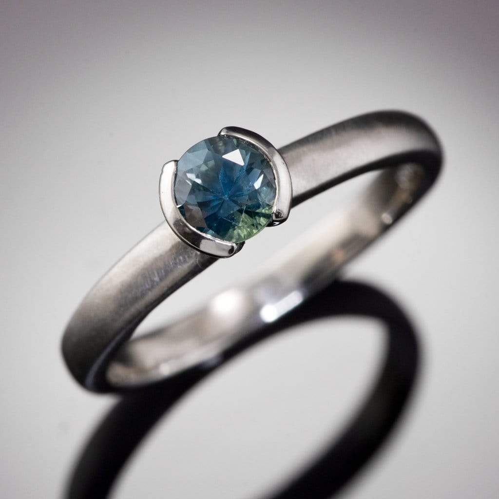 Fair Trade Teal / Blue Montana Sapphire Tulip Half Bezel Solitaire Engagement Ring Ring by Nodeform