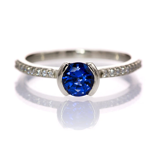Blue Lab-Grown Sapphire Half Bezel Diamond Pave Engagement Ring 5mm Lab-Grown Sapphire / 14k Nickel White Gold (Not Rhodium Plated) Ring by Nodeform