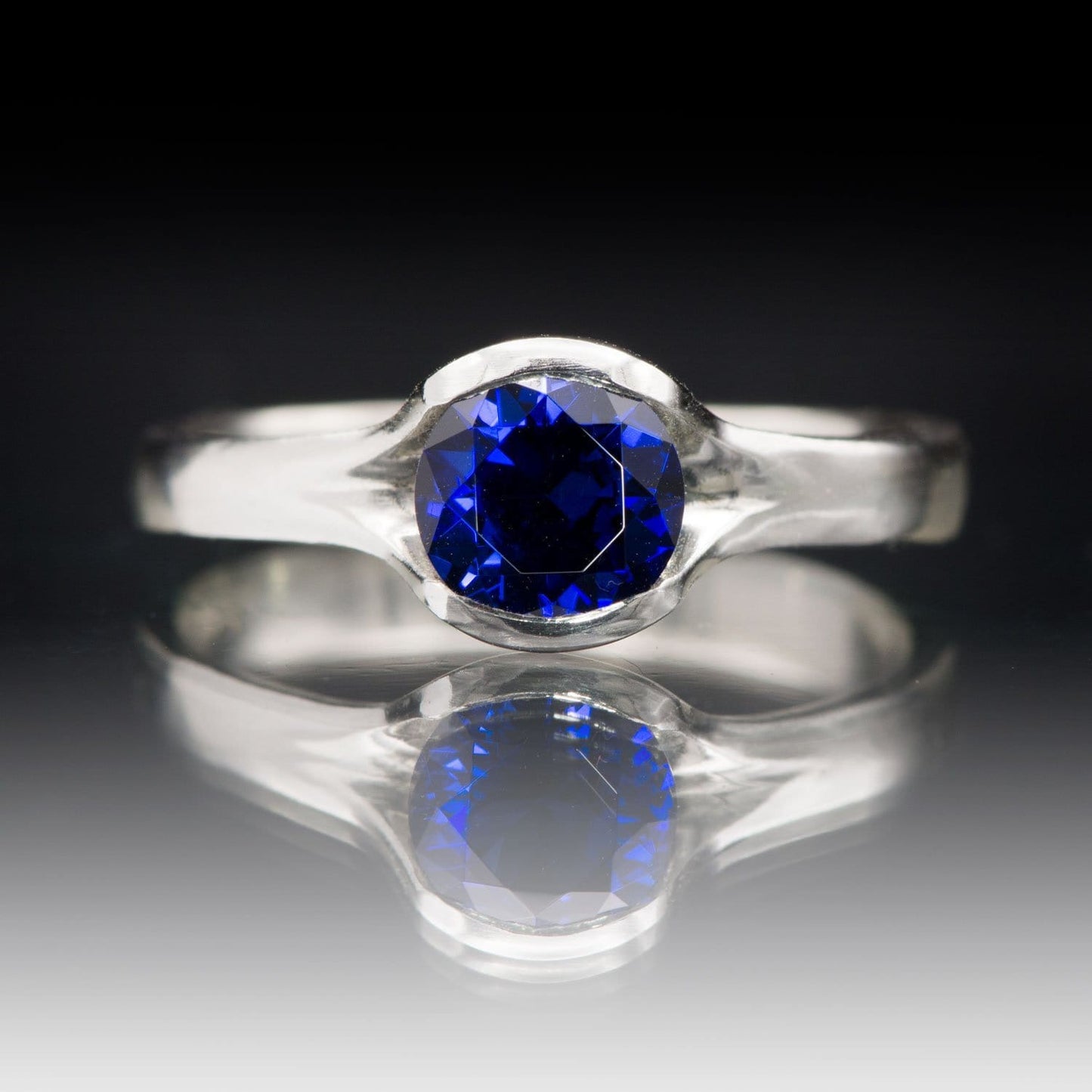 Lab Created Round Blue Sapphire Fold Solitaire Engagement Ring Ring by Nodeform
