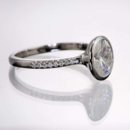 Oval Moissanite Peekaboo Bezel Diamond Pave Engagement Ring Ring by Nodeform