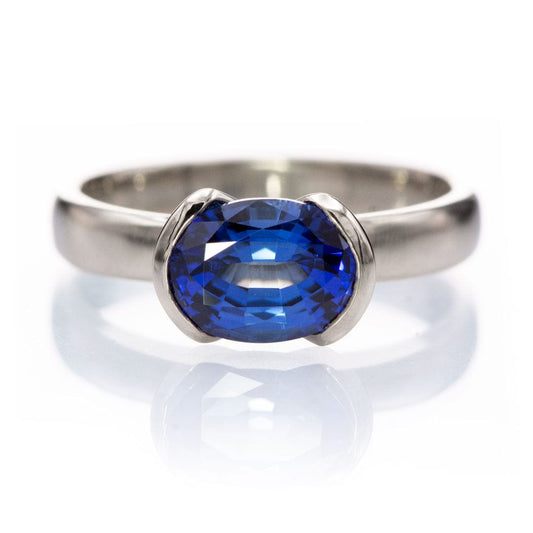 Chatham Lab Created Oval Blue Sapphire Half Bezel Solitaire Engagement Ring 14kPD White Gold / Chatham 8x6mm/1.75ct Ring by Nodeform