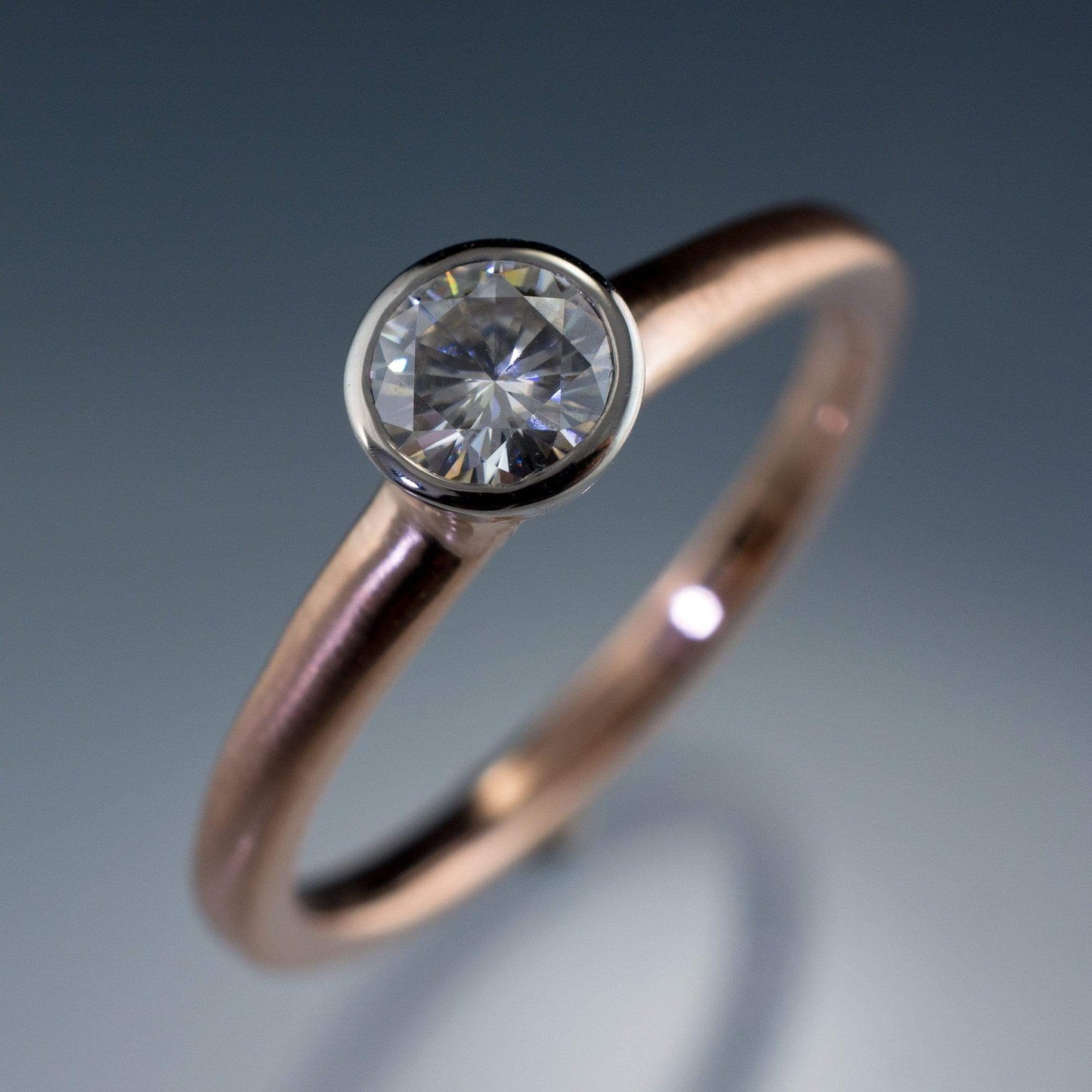 Mixed Metal Round Moissanite Bezel Set Solitaire Engagement Ring Ring by Nodeform