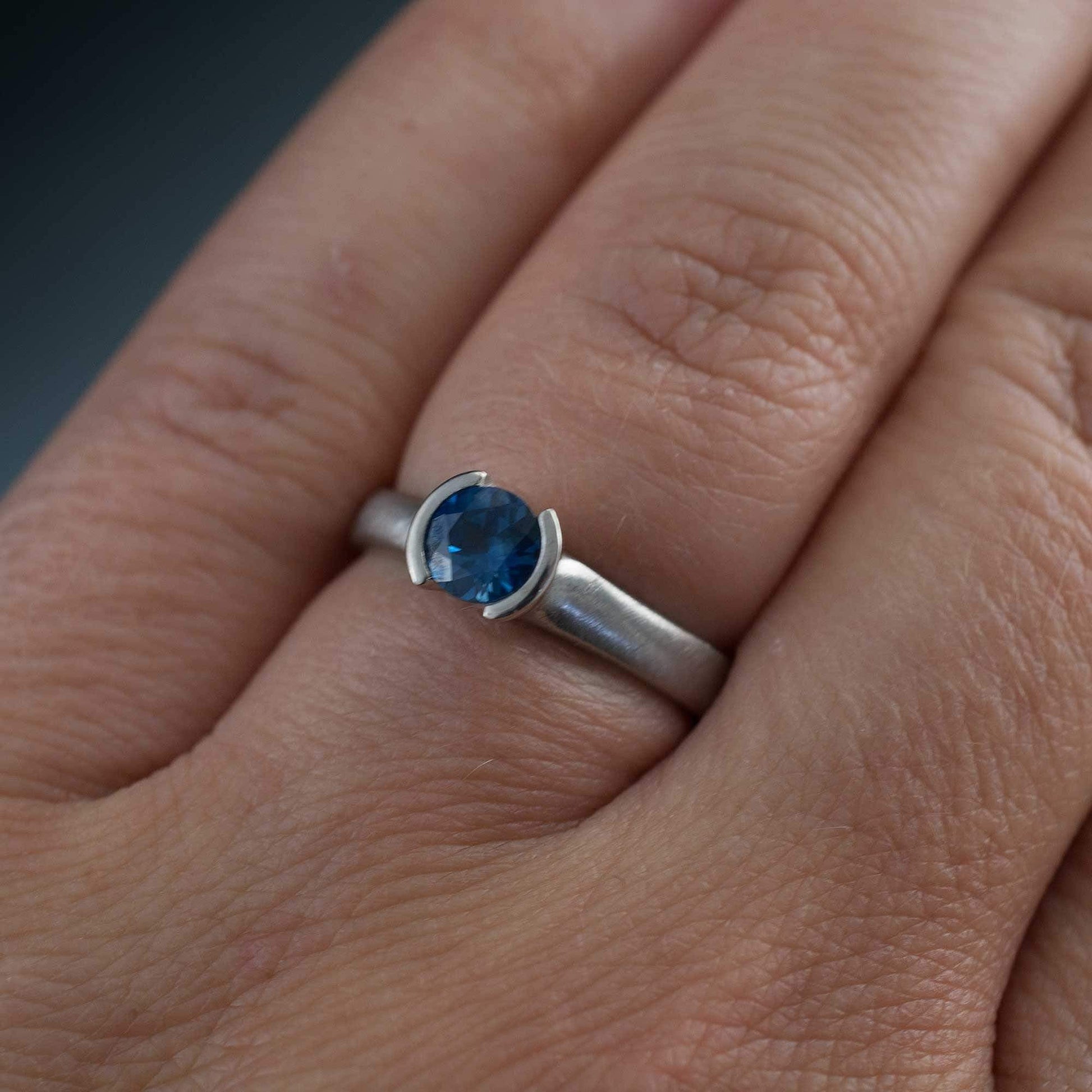 Round Fair Trade Blue Teal Blue Malawi Sapphire Half Bezel Solitaire Engagement Ring Ring by Nodeform