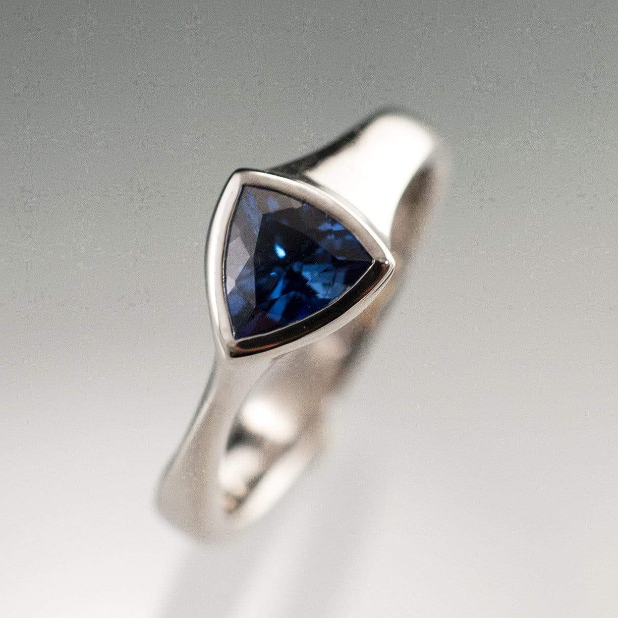 Trillion Lab Created Blue Sapphire Bezel Solitaire Engagement Ring Ring by Nodeform