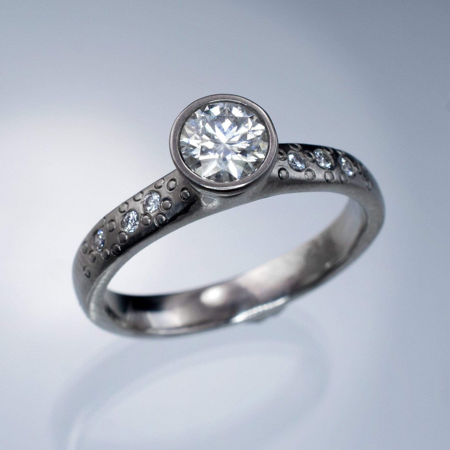 Moissanite Round Full Bezel Set Star Dust Engagement Ring Ring by Nodeform