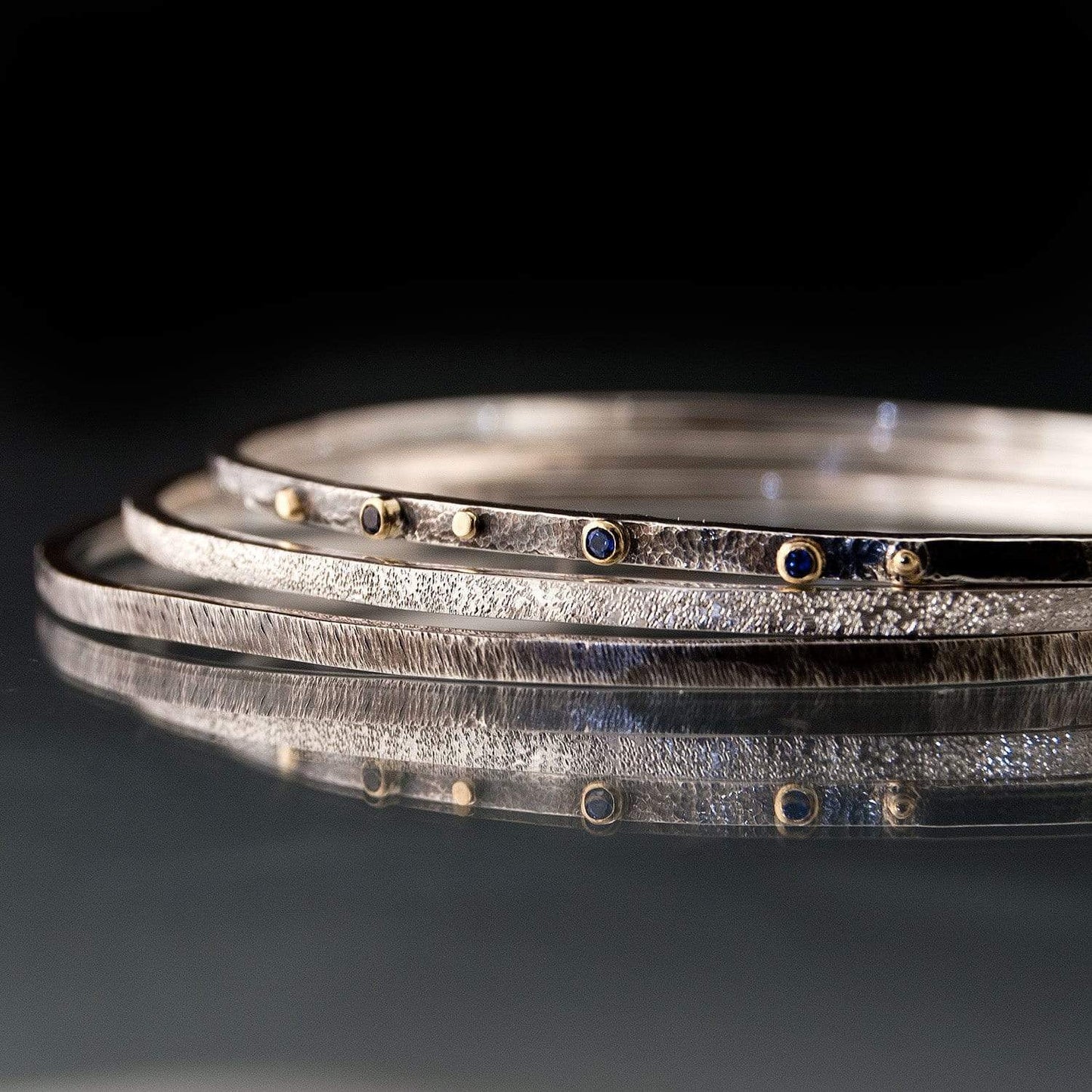 Textured Silver Bracelet Set with Blue Sapphires and 18k Gold Accents Bracelet by Nodeform