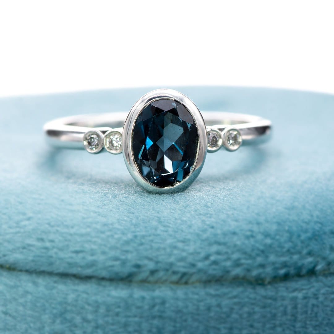 Brooklynn Bezel Set Oval London Blue Topaz Ring with Diamond Accents Sterling Silver