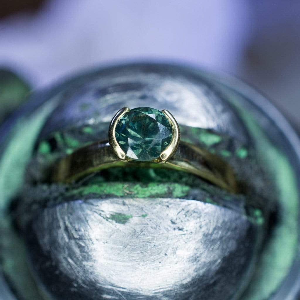 Fair Trade Green/ Blue Montana Sapphire Half Bezel Solitaire Engagement Ring Ring by Nodeform