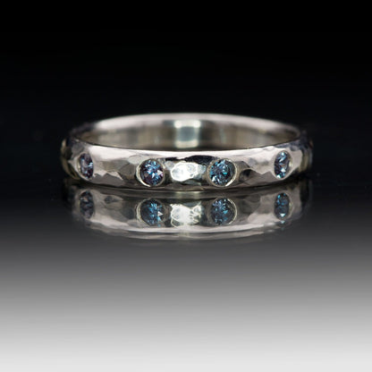 Narrow Hammered Texture Wedding Band With Flush Set Alexandrites Ring by Nodeform