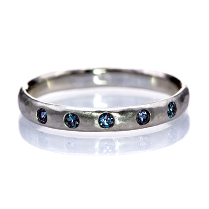 Narrow Hammered Texture Wedding Band With Flush Set Alexandrites Ring by Nodeform