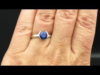 Lab Created Round Blue Sapphire Half Bezel Solitaire Engagement Ring