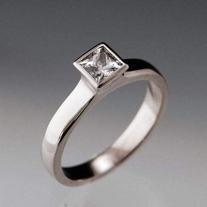 Princess Cut White Sapphire Bezel Solitaire Engagement Ring Ring by Nodeform