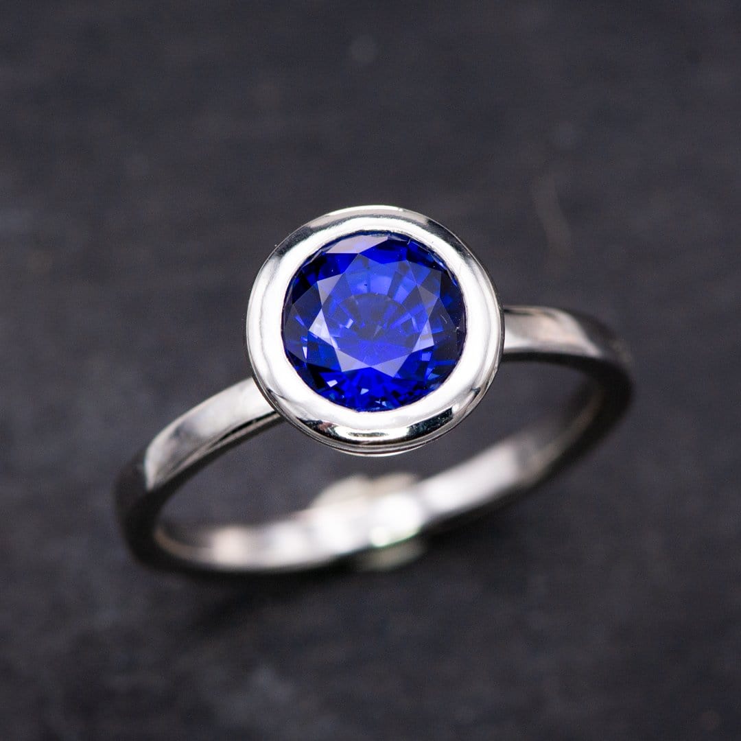 Minimal Round Chatham Blue Sapphire Wide Bezel Solitaire Engagement Ring Ring by Nodeform