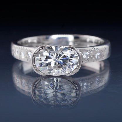 Oval Moissanite Ring Half Bezel Star Dust Engagement Ring 7x5mm Forever One / 18kPD White Gold Ring by Nodeform