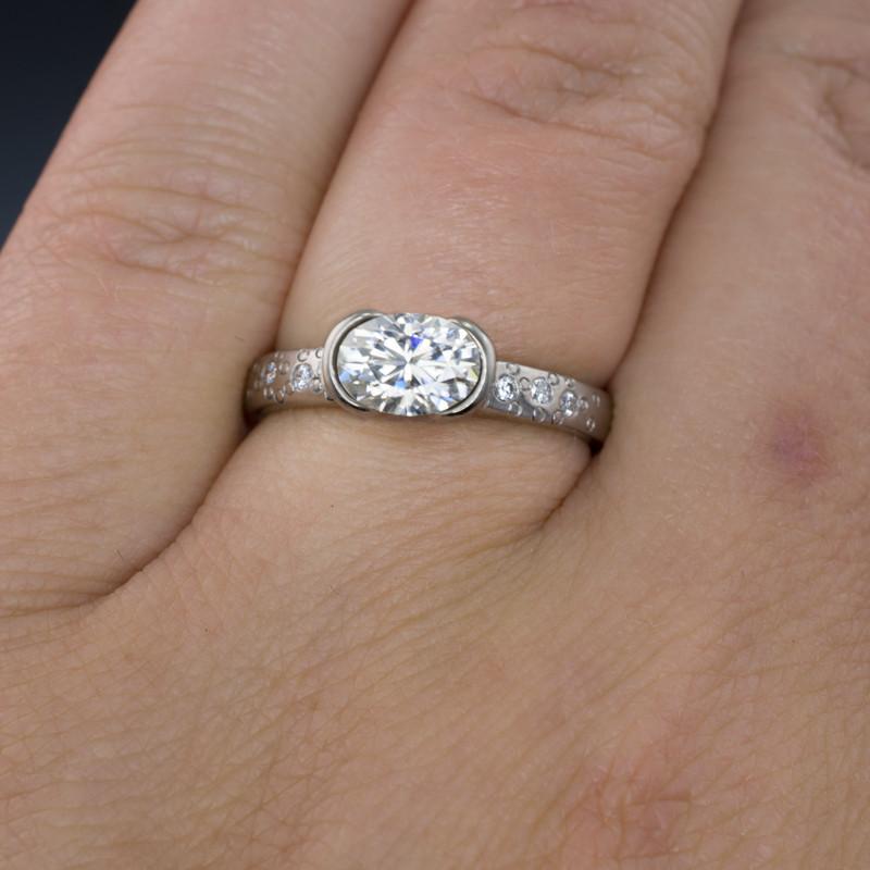 Oval Moissanite Ring Half Bezel Star Dust Engagement Ring Ring by Nodeform