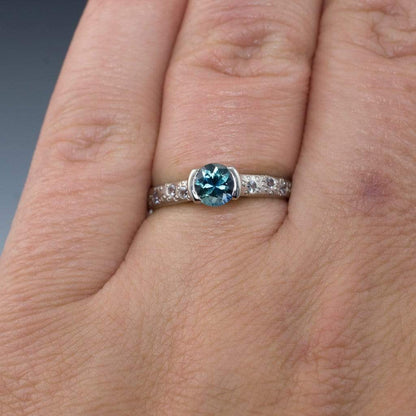 Fair Trade Teal/Blue Montana Sapphire Half Bezel White Sapphire Star Dust Engagement Ring Ring by Nodeform